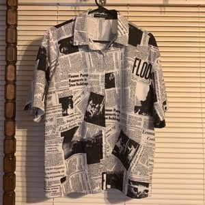 An XL Button up black and white news paper shirt from SHEIN